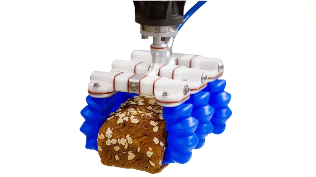 ein Unigripper Softgripper greift ein Kastenbrot